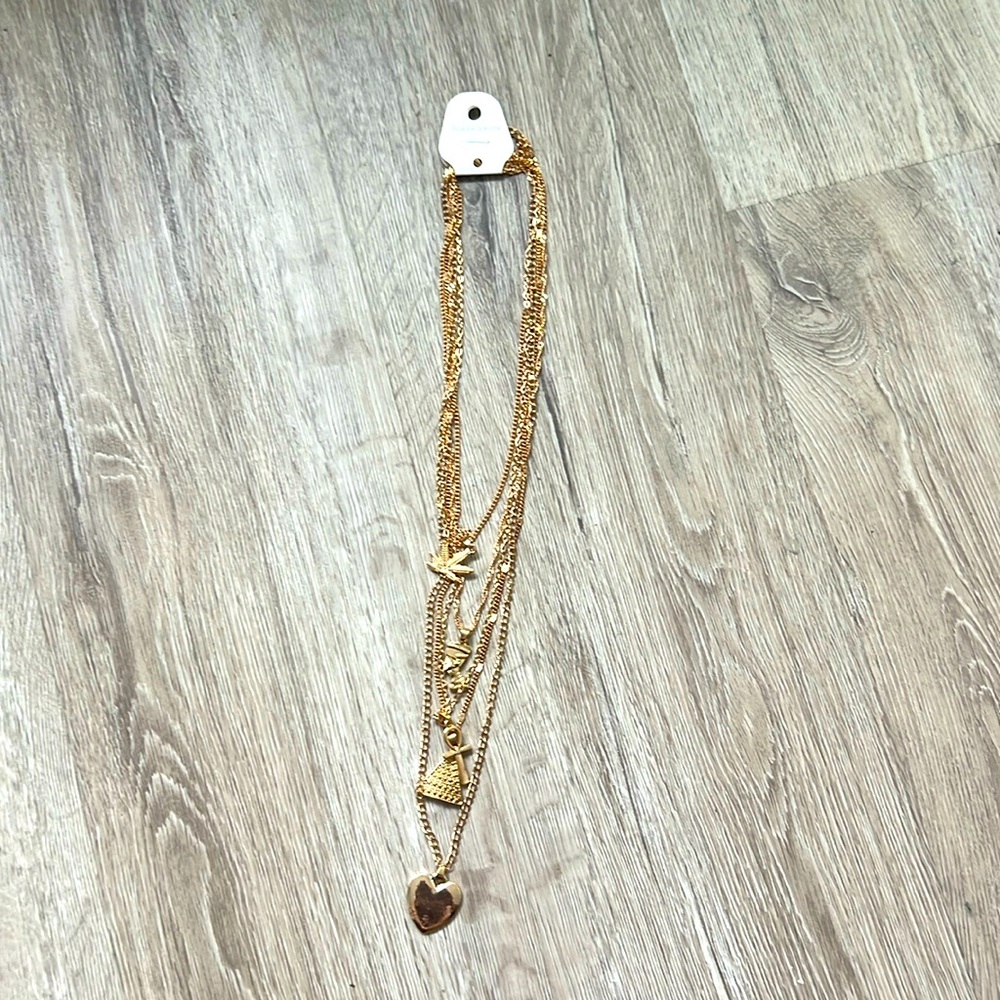 Gold plated “Mother land” necklace.